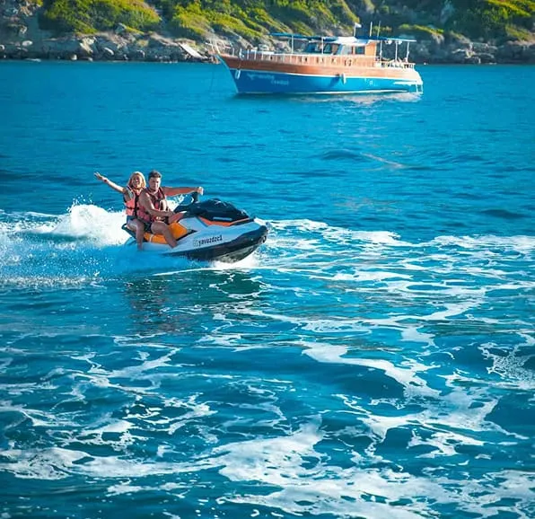 Jet skis on bright blue sea