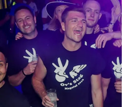 Stag party group at night