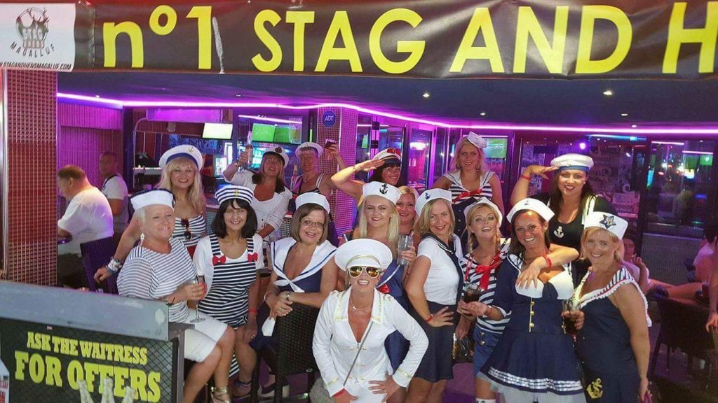 group of ladies on hen party outside of bar in Magaluf